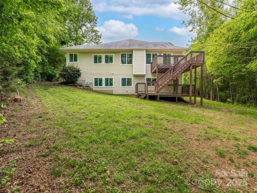 33 Village Pointe Lane, Asheville, NC 28803.  MLS# CAR4254974, YatesRealty ID 32453. Nice level lot for safe playtime and adventures