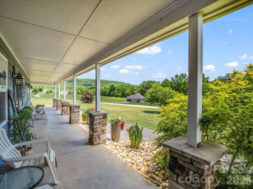 157 Cherry Ridge Drive, Bostic, NC 28018.  MLS# CAR4386104, YatesRealty ID 32455. Expansive front porch with mountain views