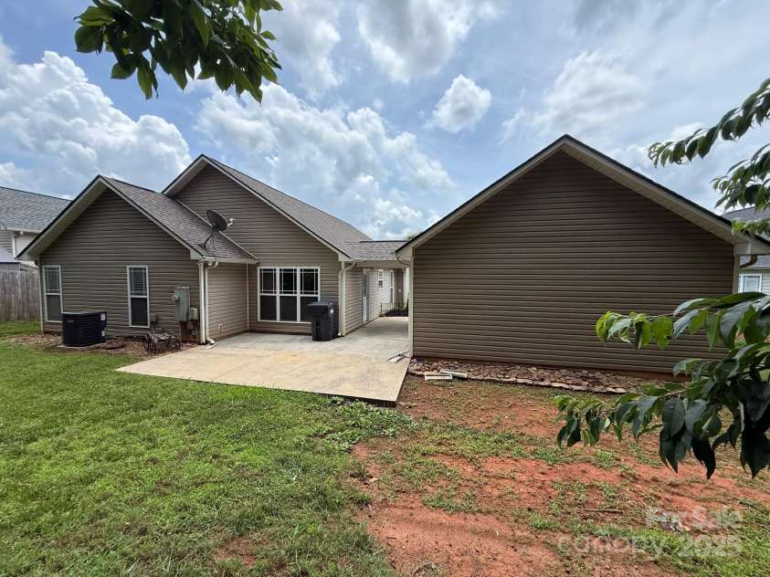 156 Tarrington Drive, Statesville, NC 28625.  MLS# CAR4271748, YatesRealty ID 32457. Rear