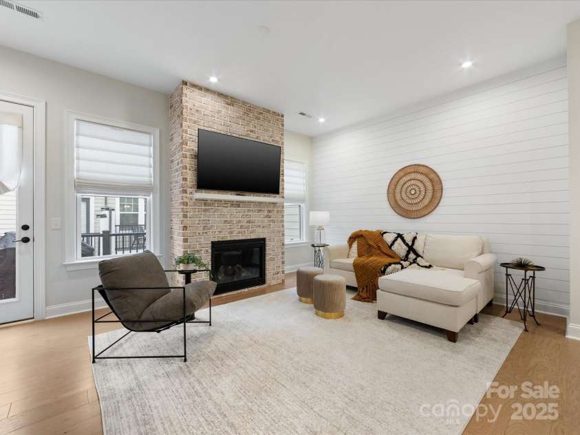 2534 Kenmore Avenue, Charlotte, NC 28204.  MLS# CAR4289326, YatesRealty ID 32459. Living Room with ship-lap feature wall