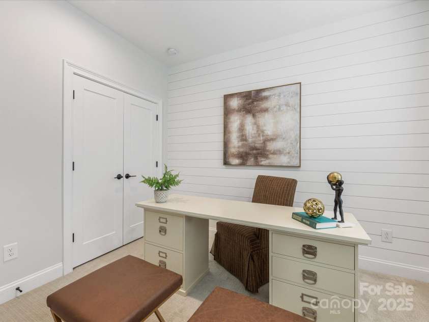 2534 Kenmore Avenue, Charlotte, NC 28204.  MLS# CAR4289326, YatesRealty ID 32459. Lower level bedroom