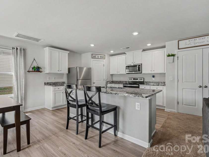 562 Lamorak Place, Richburg, SC 29729.  MLS# CAR4389679, YatesRealty ID 32464. Kitchen with granite counters