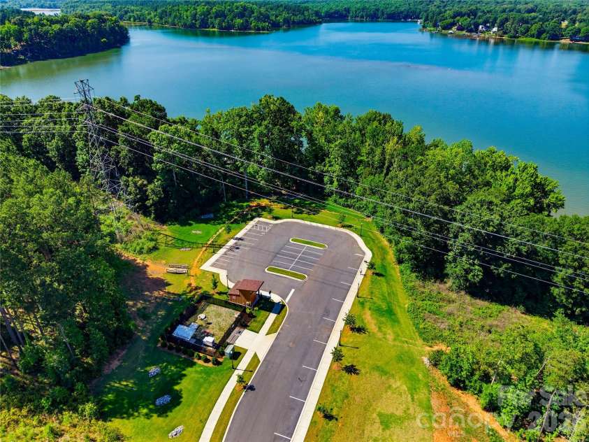124 Van Gogh Trail, Mount Holly, NC 28120.  MLS# CAR4366924, YatesRealty ID 32468. Community Dock Parking