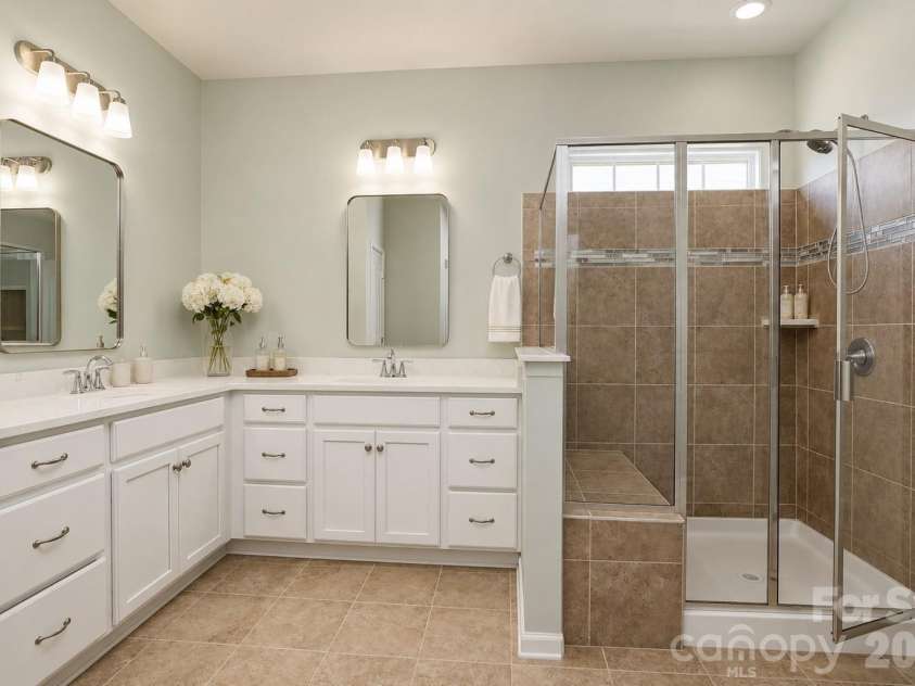 124 Van Gogh Trail, Mount Holly, NC 28120.  MLS# CAR4366924, YatesRealty ID 32468. Dual Vanity Sinks with Updated Mirrors and Quartz Countertops