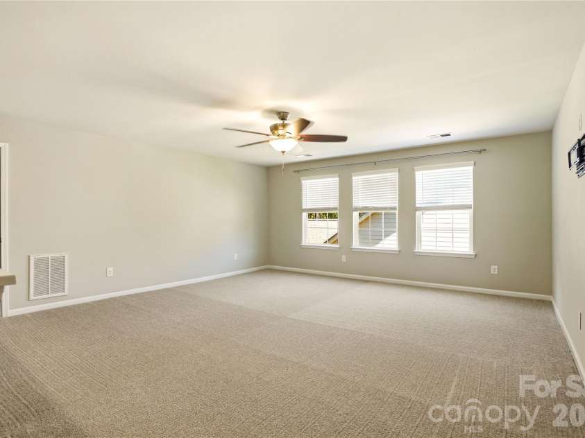 124 Van Gogh Trail, Mount Holly, NC 28120.  MLS# CAR4366924, YatesRealty ID 32468. Expansive Upper Loft