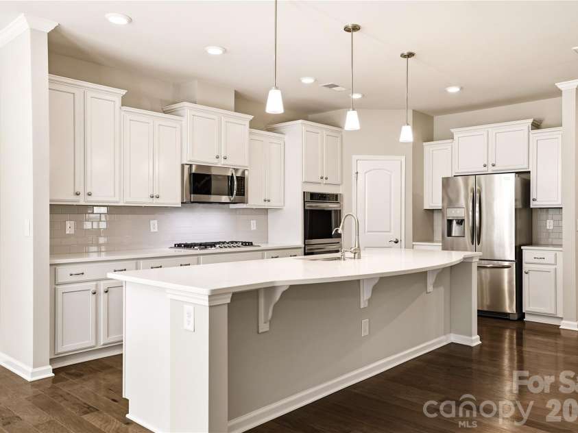 124 Van Gogh Trail, Mount Holly, NC 28120.  MLS# CAR4366924, YatesRealty ID 32468. Oversized Statement Island Centerpiece