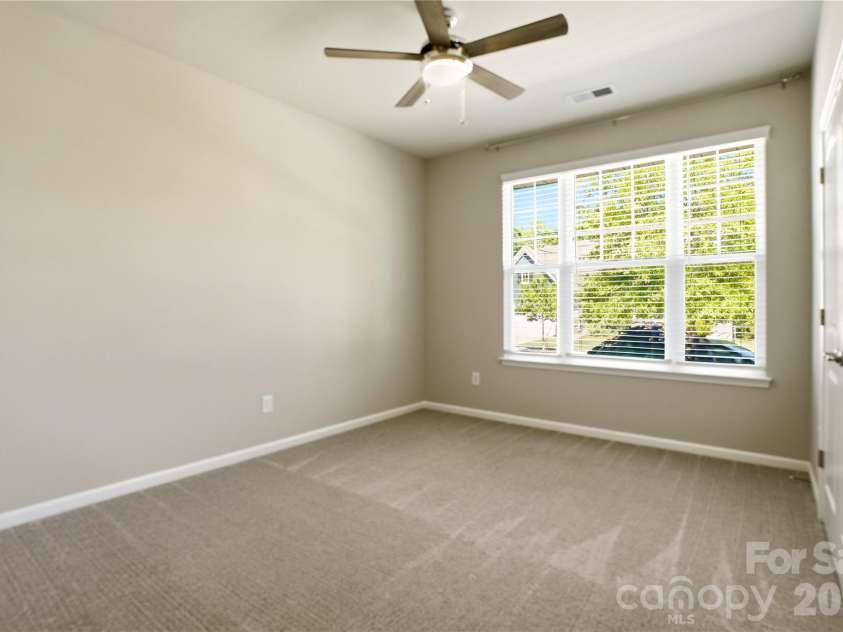 124 Van Gogh Trail, Mount Holly, NC 28120.  MLS# CAR4366924, YatesRealty ID 32468. Secondary Bedroom