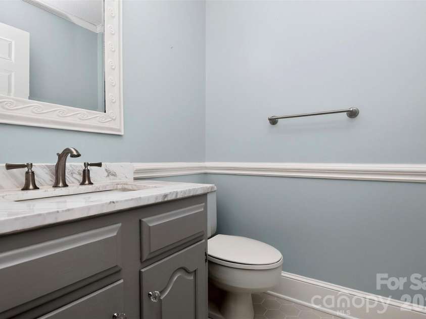 971 Stanley Lucia Road, Mount Holly, NC 28120.  MLS# CAR4388233, YatesRealty ID 32471. Powder room located on the main level.