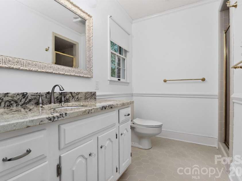 971 Stanley Lucia Road, Mount Holly, NC 28120.  MLS# CAR4388233, YatesRealty ID 32471. Primary bathroom.