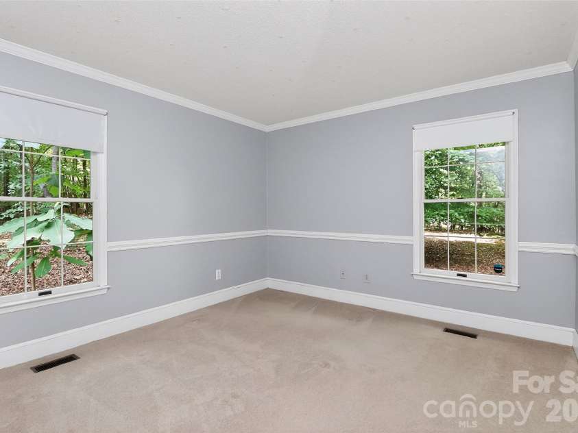 971 Stanley Lucia Road, Mount Holly, NC 28120.  MLS# CAR4388233, YatesRealty ID 32471. Secondary bedroom 1