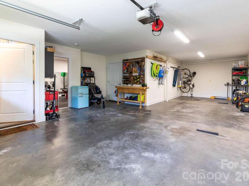 32 Greenwood Fields Drive, Asheville, NC 28804.  MLS# CAR4389638, YatesRealty ID 32475. Tandem Garage