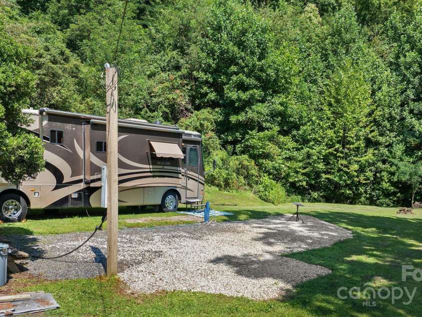 651 Lower Stecoah Road, Robbinsville, NC 28771.  MLS# CAR4293028, YatesRealty ID 32477. RV lot w/electricity, water, septic and 50 amp hookup