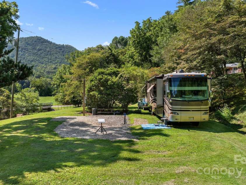 651 Lower Stecoah Road, Robbinsville, NC 28771.  MLS# CAR4293028, YatesRealty ID 32477. RV lot w/electricity, water, septic and 50 amp hookup