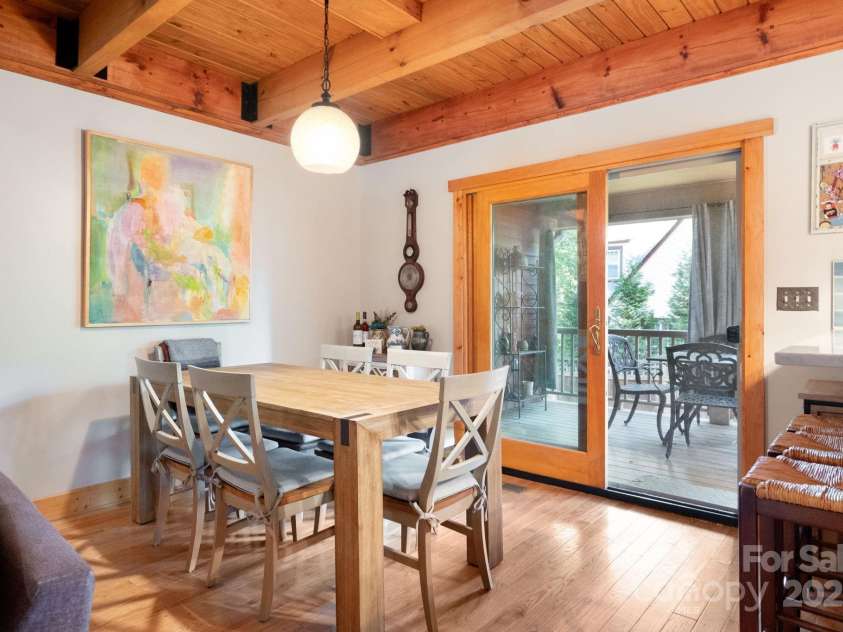 1 Buckingham Court, Asheville, NC 28803.  MLS# CAR4283545, YatesRealty ID 32483. Dining area can extend to private back patio