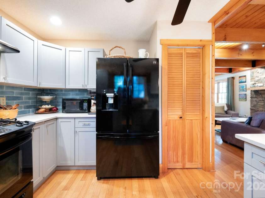 1 Buckingham Court, Asheville, NC 28803.  MLS# CAR4283545, YatesRealty ID 32483. Pantry in kitchen provides additional space