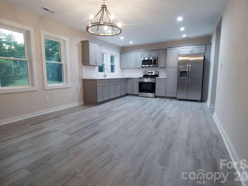 435 Whitley Street, Norwood, NC 28128.  MLS# CAR4392182, YatesRealty ID 32484. Kitchen/Dining area