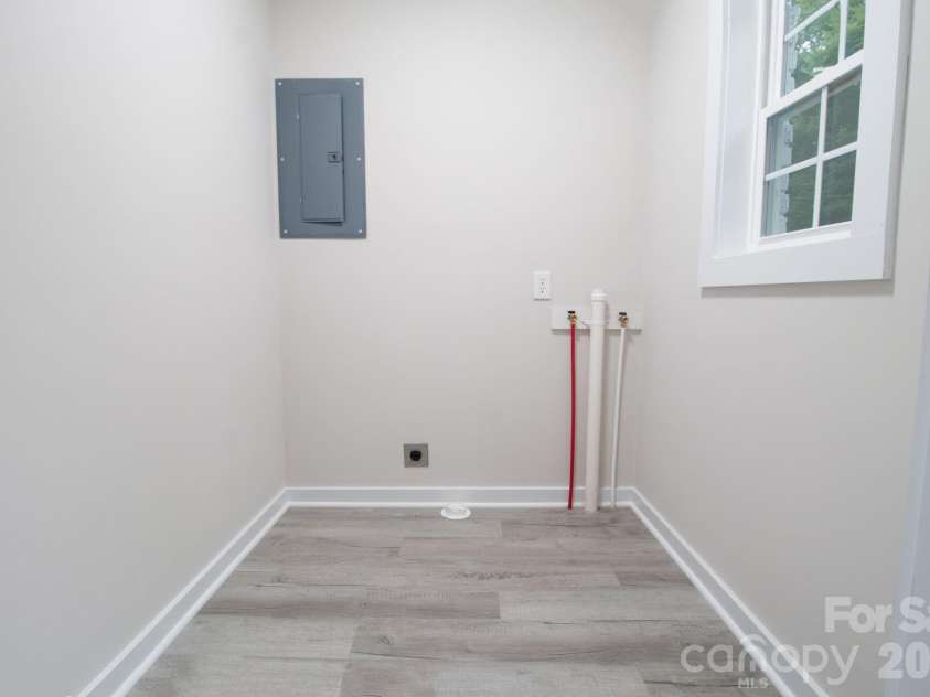 435 Whitley Street, Norwood, NC 28128.  MLS# CAR4392182, YatesRealty ID 32484. Laundry room