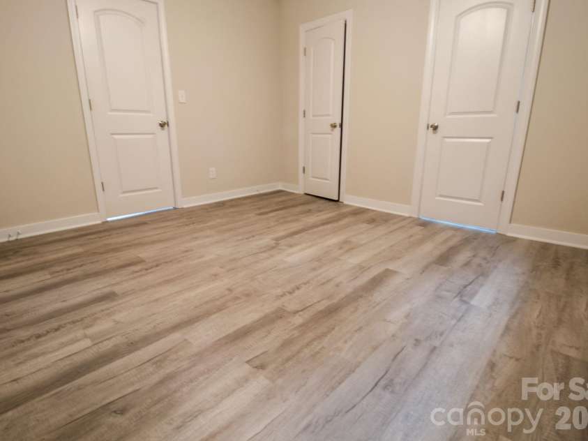 435 Whitley Street, Norwood, NC 28128.  MLS# CAR4392182, YatesRealty ID 32484. Primary bedroom with full bath