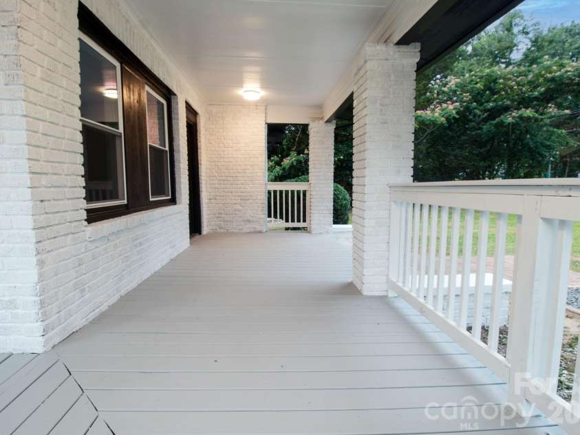 435 Whitley Street, Norwood, NC 28128.  MLS# CAR4392182, YatesRealty ID 32484. Wrap around covered front porch