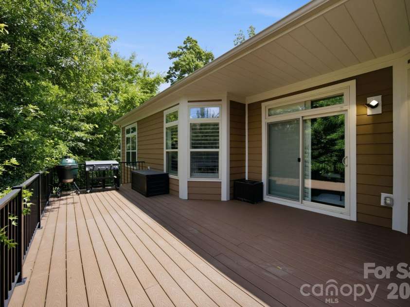 18745 Daymark Drive, Cornelius, NC 28031.  MLS# CAR4396017, YatesRealty ID 32489. Deck off dining area.