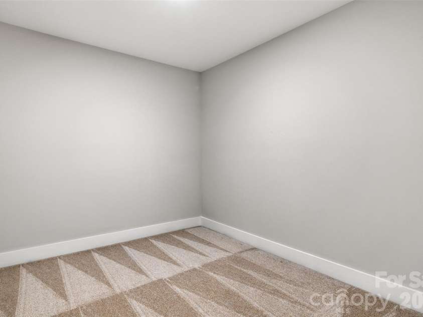 3826 Dewitt Lane, Charlotte, NC 28217.  MLS# CAR4389076, YatesRealty ID 32490. Finished storage room, or Flex Room