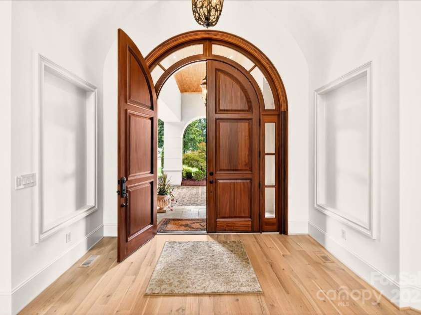 4042 Blossom Hill Drive, Matthews, NC 28104.  MLS# CAR4288024, YatesRealty ID 32490. Custom entry door
