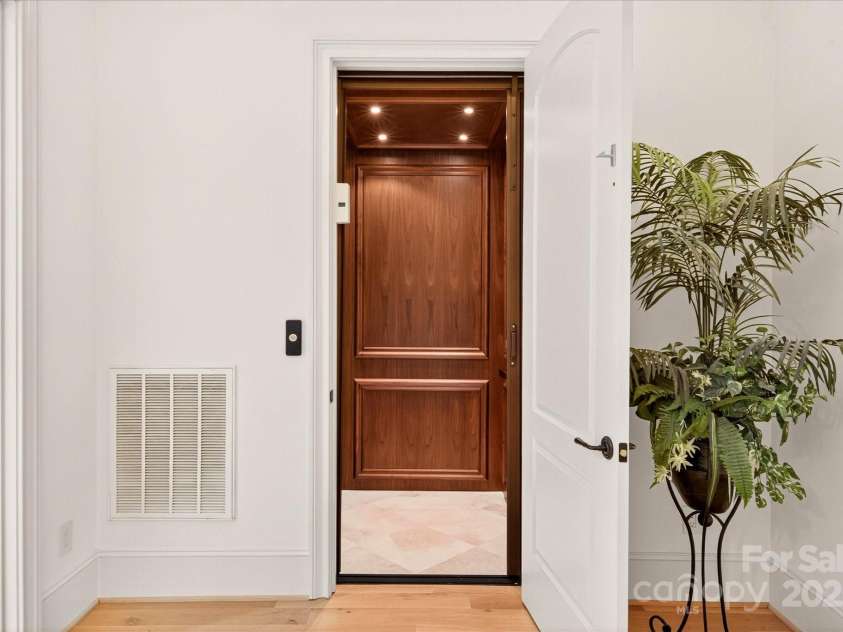 4042 Blossom Hill Drive, Matthews, NC 28104.  MLS# CAR4288024, YatesRealty ID 32490. Elevator