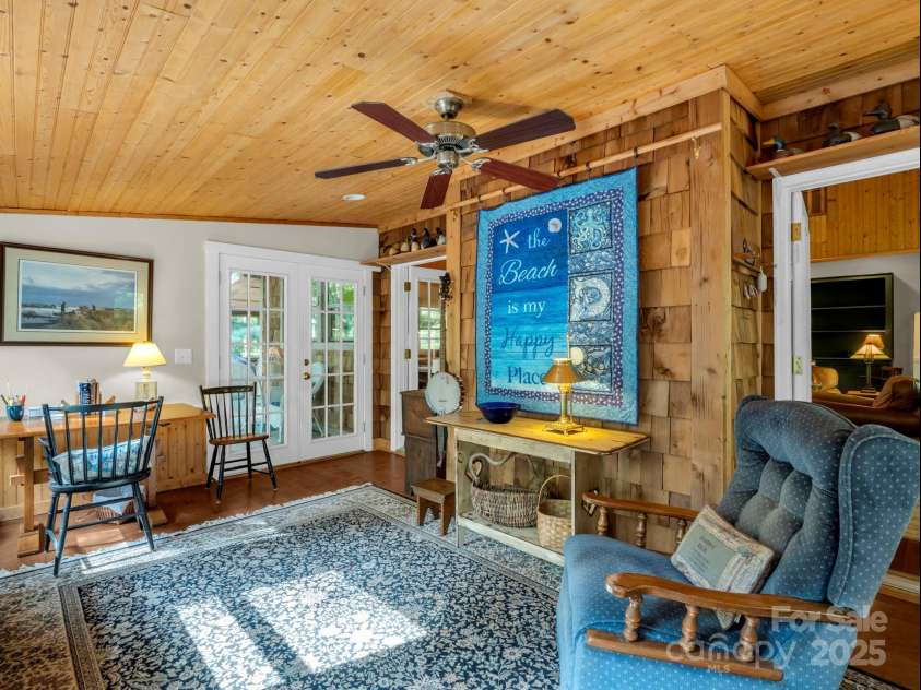 656 Cardinal Road, Brevard, NC 28712.  MLS# CAR4286905, YatesRealty ID 32491. All seasons room with entrance to porch