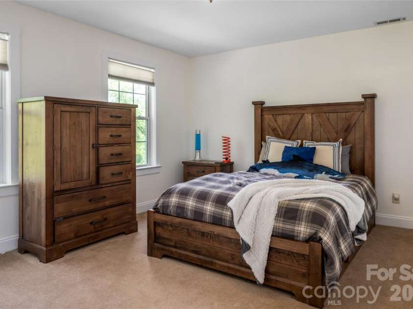 10 Lark Hill Drive, Arden, NC 28704.  MLS# CAR4395452, YatesRealty ID 32492. Upper Level Guest Bedroom 1 with Shared Bath