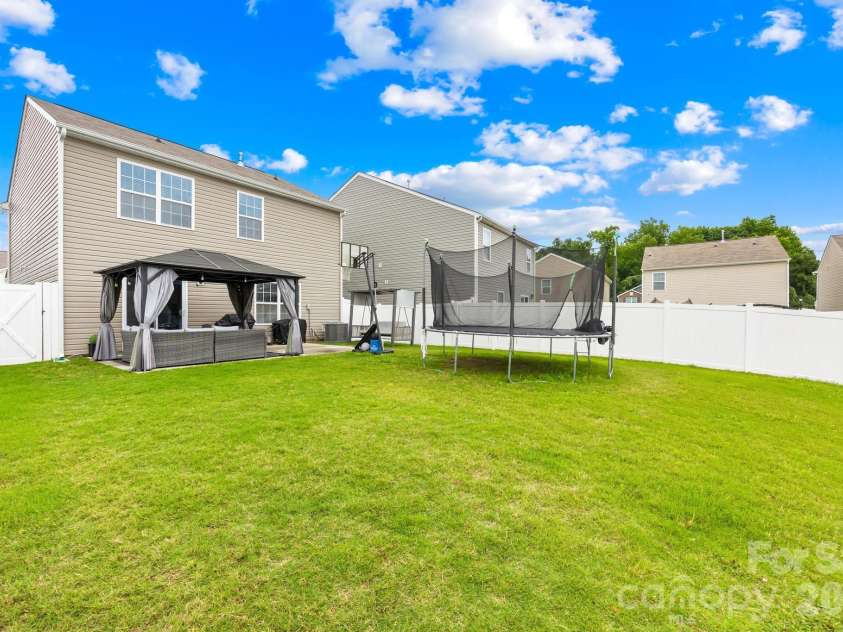2611 Idared Drive, Dallas, NC 28034.  MLS# CAR4382685, YatesRealty ID 32493. Large fenced-in yard