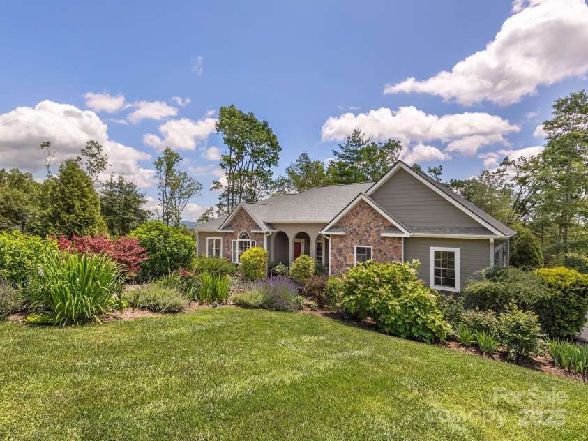 446 Charming Lane, Hendersonville, NC 28792.  MLS# CAR4287765, YatesRealty ID 32506. Beautifully maintained one-level home in a nature-filled setting 15 min from downtown Hendersonville!