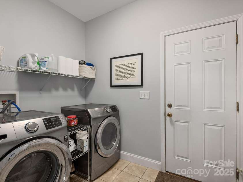 446 Charming Lane, Hendersonville, NC 28792.  MLS# CAR4287765, YatesRealty ID 32506. Spacious laundry room