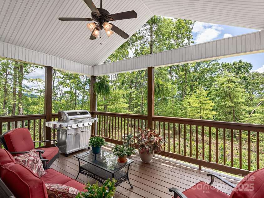 446 Charming Lane, Hendersonville, NC 28792.  MLS# CAR4287765, YatesRealty ID 32506. Stunning pack patio perfect for gathering, grilling, and enjoying the natural surrounding