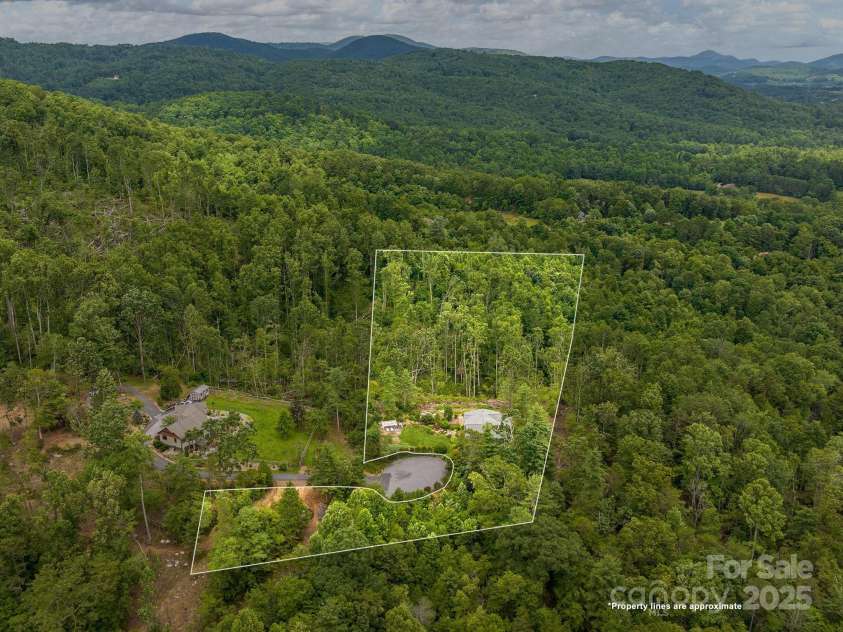 446 Charming Lane, Hendersonville, NC 28792.  MLS# CAR4287765, YatesRealty ID 32506. Two lots for privacy and views!!