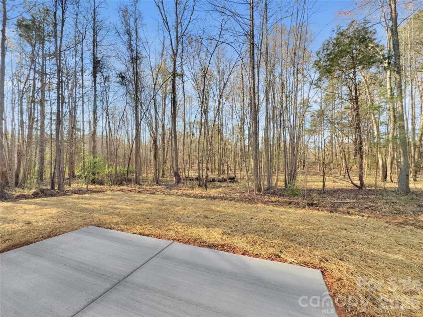 2338 Neill Road, Lancaster, SC 29720.  MLS# CAR4351976, YatesRealty ID 32515. Patio overlooking wooded back yard
