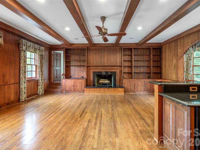 14 Brookside Road, Asheville, NC 28803.  MLS# CAR4372126, YatesRealty ID 32517. Den with fireplace