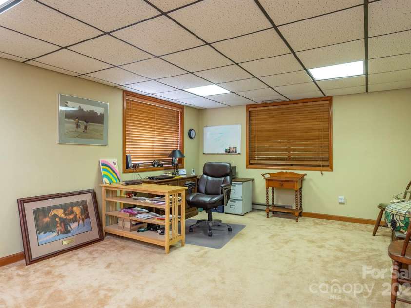 10 Chestnut Ridge Road, Mills River, NC 28759.  MLS# CAR4285429, YatesRealty ID 32518. Home office, private and quiet, tucked away from everyday living.