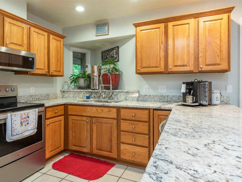 10 Chestnut Ridge Road, Mills River, NC 28759.  MLS# CAR4285429, YatesRealty ID 32518. Kitchen with plenty of cabinets and countertops.