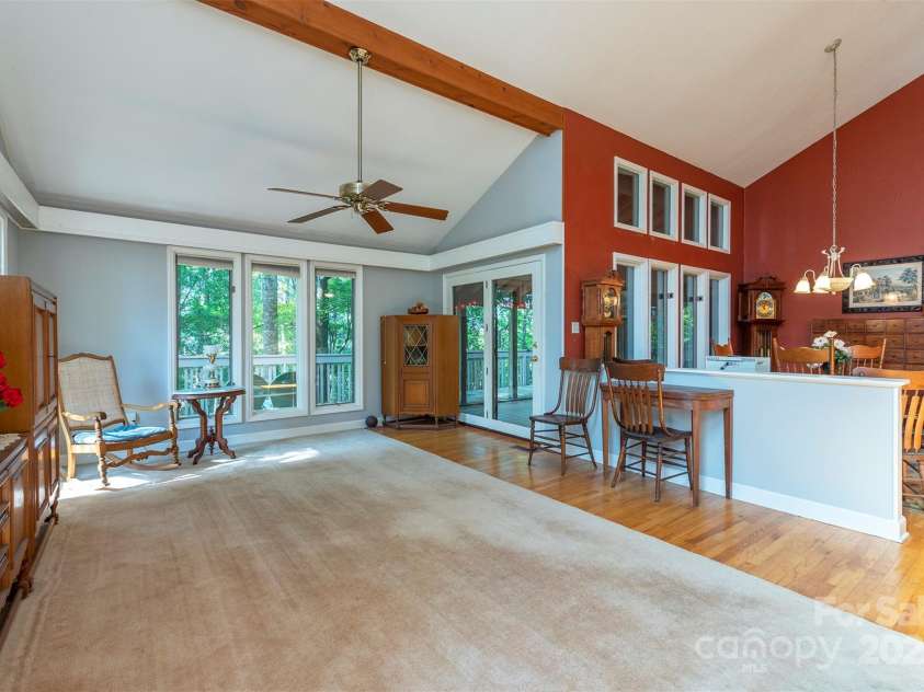 10 Chestnut Ridge Road, Mills River, NC 28759.  MLS# CAR4285429, YatesRealty ID 32518. Relax in the living room with peaceful outdoor views