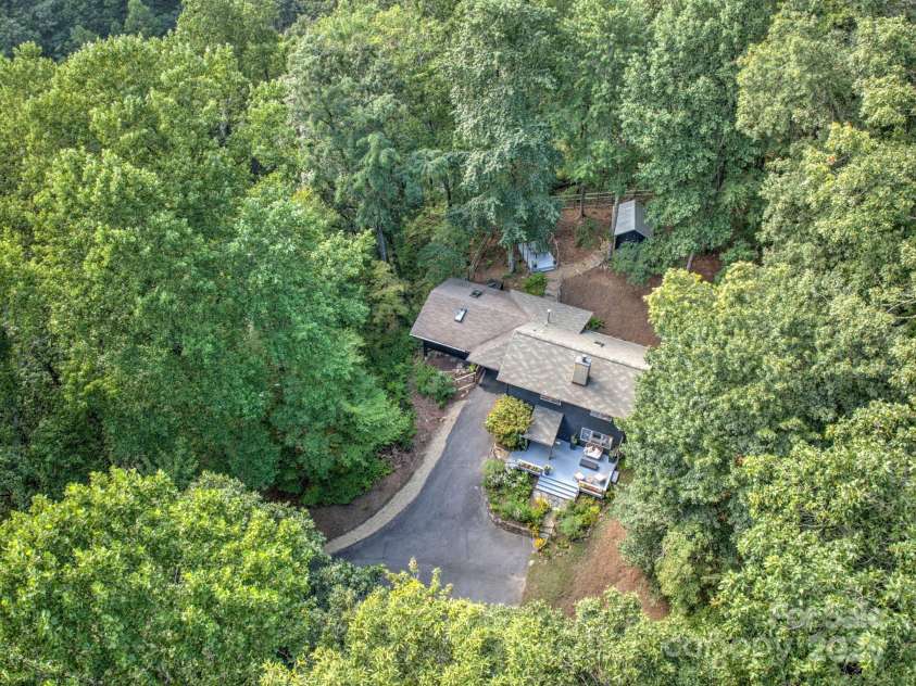 48 Black Oak Forest Road, Fairview, NC 28730.  MLS# CAR4275756, YatesRealty ID 32522. Privacy at its BEST w/ SE exposure