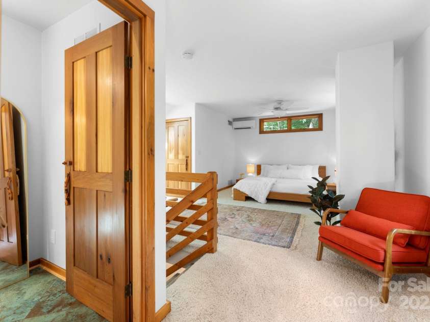 48 Black Oak Forest Road, Fairview, NC 28730.  MLS# CAR4275756, YatesRealty ID 32522. Spacious Primary Suite w/ 2 walk-in closets