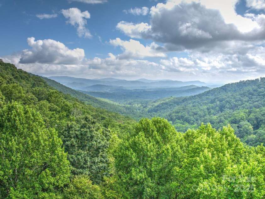 48 Black Oak Forest Road, Fairview, NC 28730.  MLS# CAR4275756, YatesRealty ID 32522. Sun, Moon & Stars 