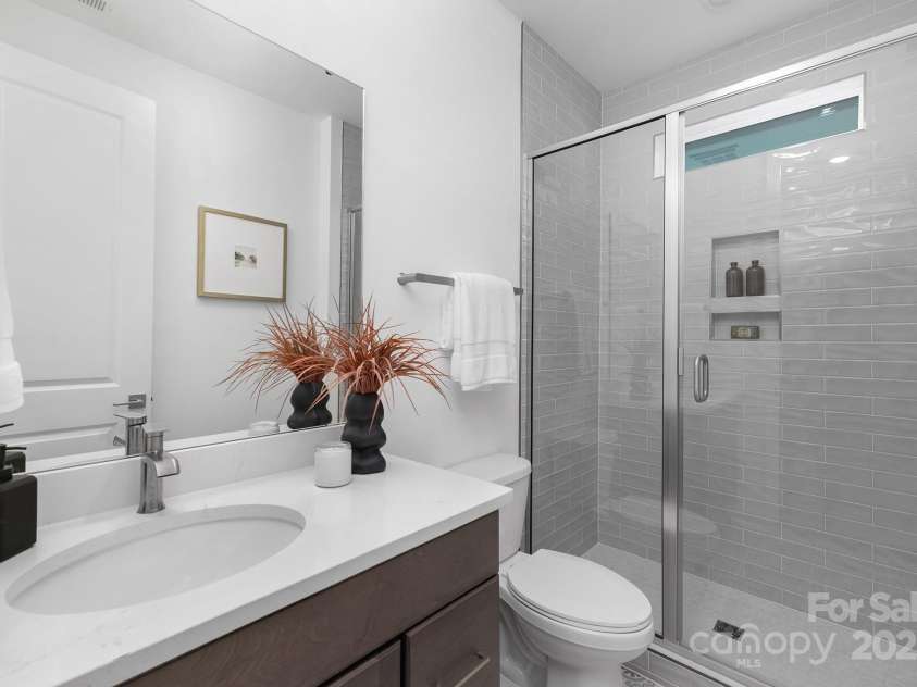359 Linda Carol Lane, Tega Cay, SC 29708.  MLS# CAR4298113, YatesRealty ID 3253. Guest bath on main