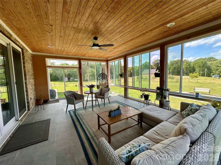 7302 Tesh Road, Monroe, NC 28110.  MLS# CAR4395848, YatesRealty ID 32533. Sun room