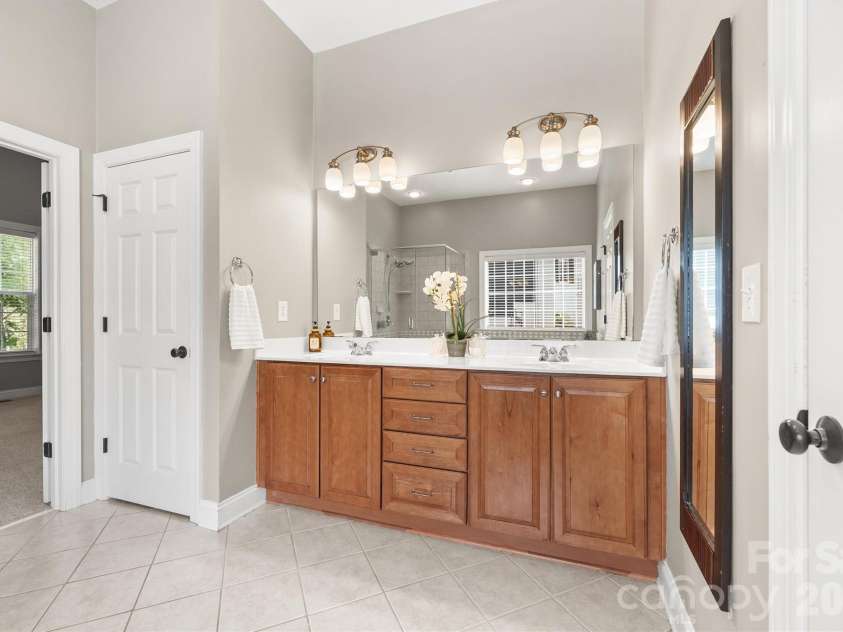 780 Fairway Point Drive, Tega Cay, SC 29708.  MLS# CAR4384591, YatesRealty ID 32536. Double Vanities