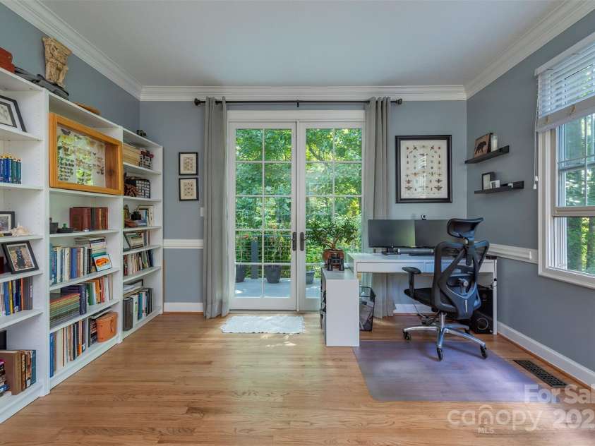 3 Lornelle Place, Asheville, NC 28804.  MLS# CAR4290670, YatesRealty ID 32541. Oversized Bookshelves and Deck Access