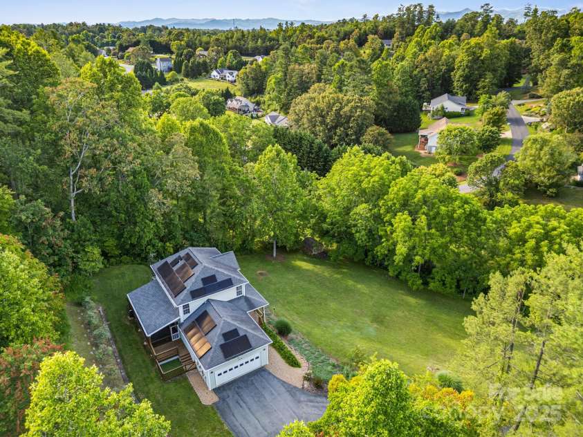 109 Southwoods Drive, Weaverville, NC 28787.  MLS# CAR4290949, YatesRealty ID 32550. Solar panels owned outright and will convey (critter guard surrounds panels)