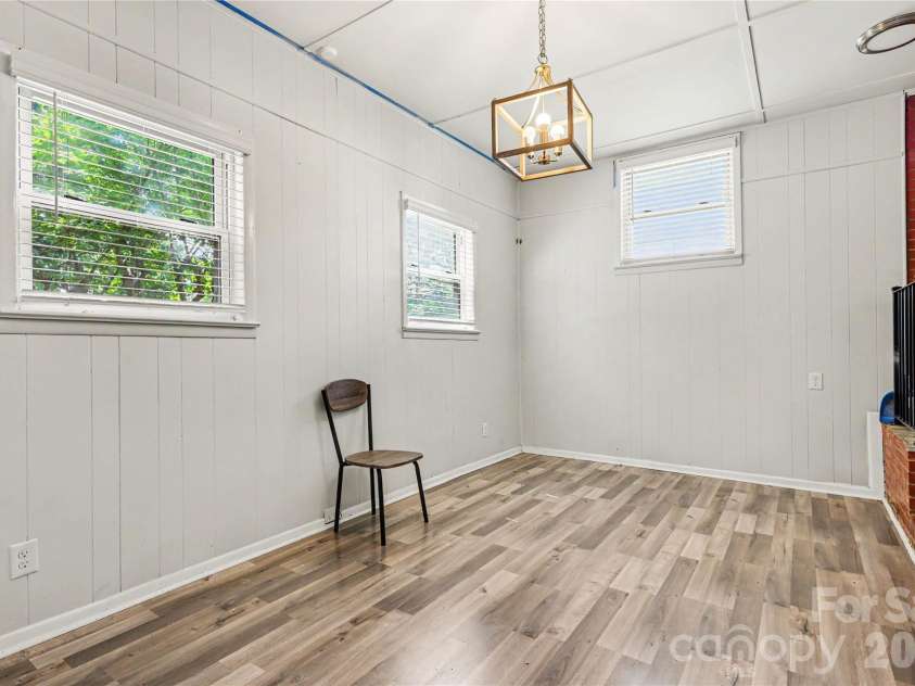 2000 Russell Avenue, Charlotte, NC 28216.  MLS# CAR4394937, YatesRealty ID 32550. Den | Sitting Room