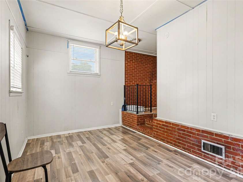 2000 Russell Avenue, Charlotte, NC 28216.  MLS# CAR4394937, YatesRealty ID 32550. Den | Sitting Room