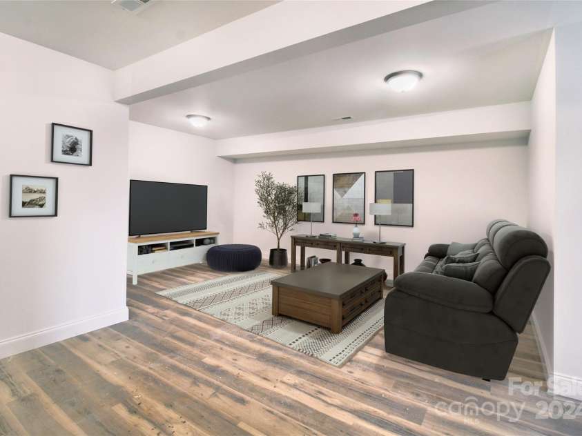 380 Quinn Hill Lane, Mars Hill, NC 28754.  MLS# CAR4127561, YatesRealty ID 32554. Basement living space staged